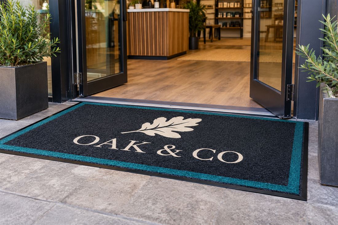 Logo floor mat: an entrance mat for a shop